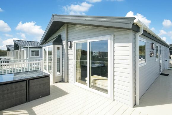 Platinum 2 Lodge (sleeps 4) with decking (Pet) - Chichester Lakeside Holiday Park, Chichester