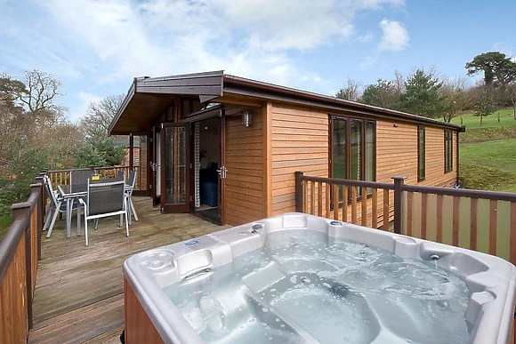 Book Shepherds Hut Spa accommodation at Glampio Gelli Glamping. Best UK  Price Guarantee